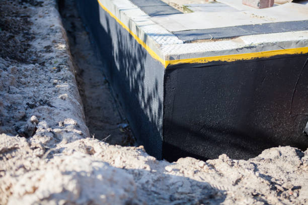Professional Waterproofing technician working in Lanham, MD